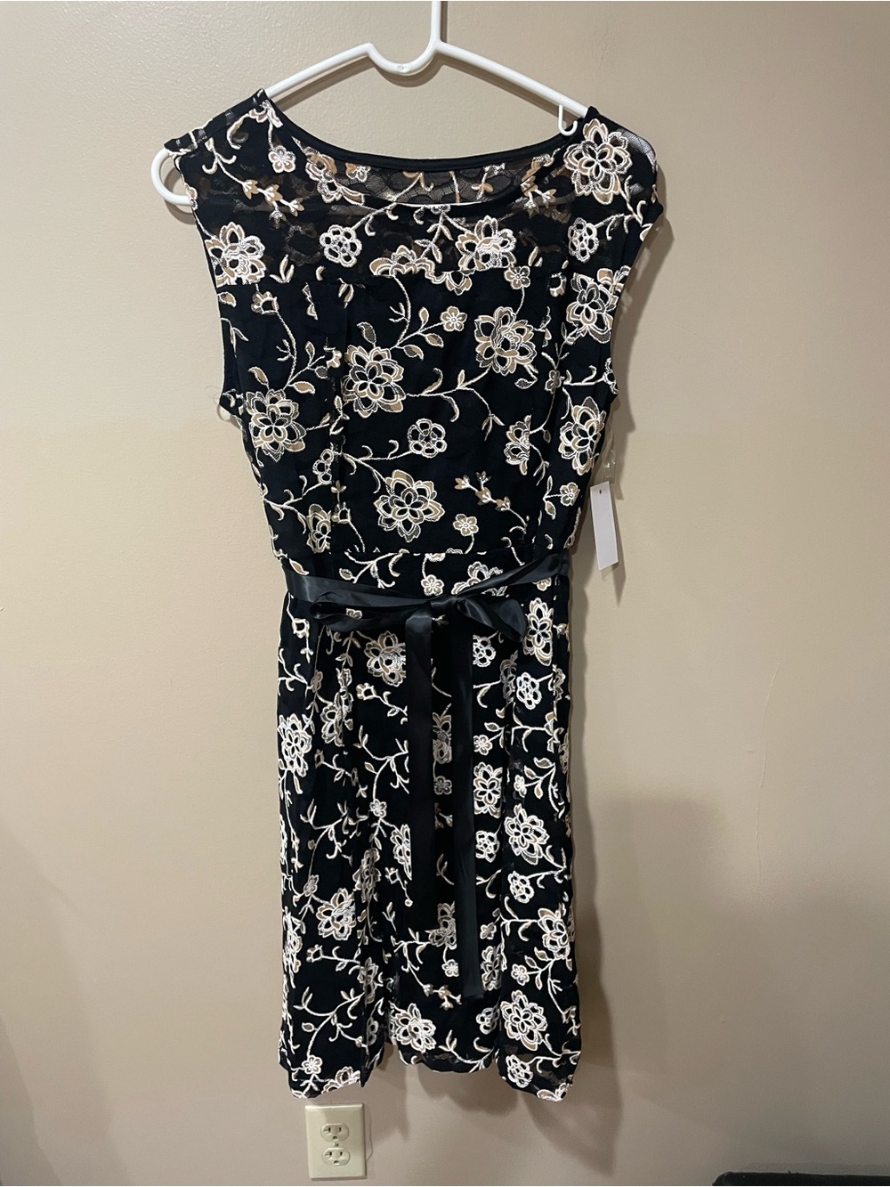 Elegant Black Midi Dress with White Floral Embroidery and Satin Tie